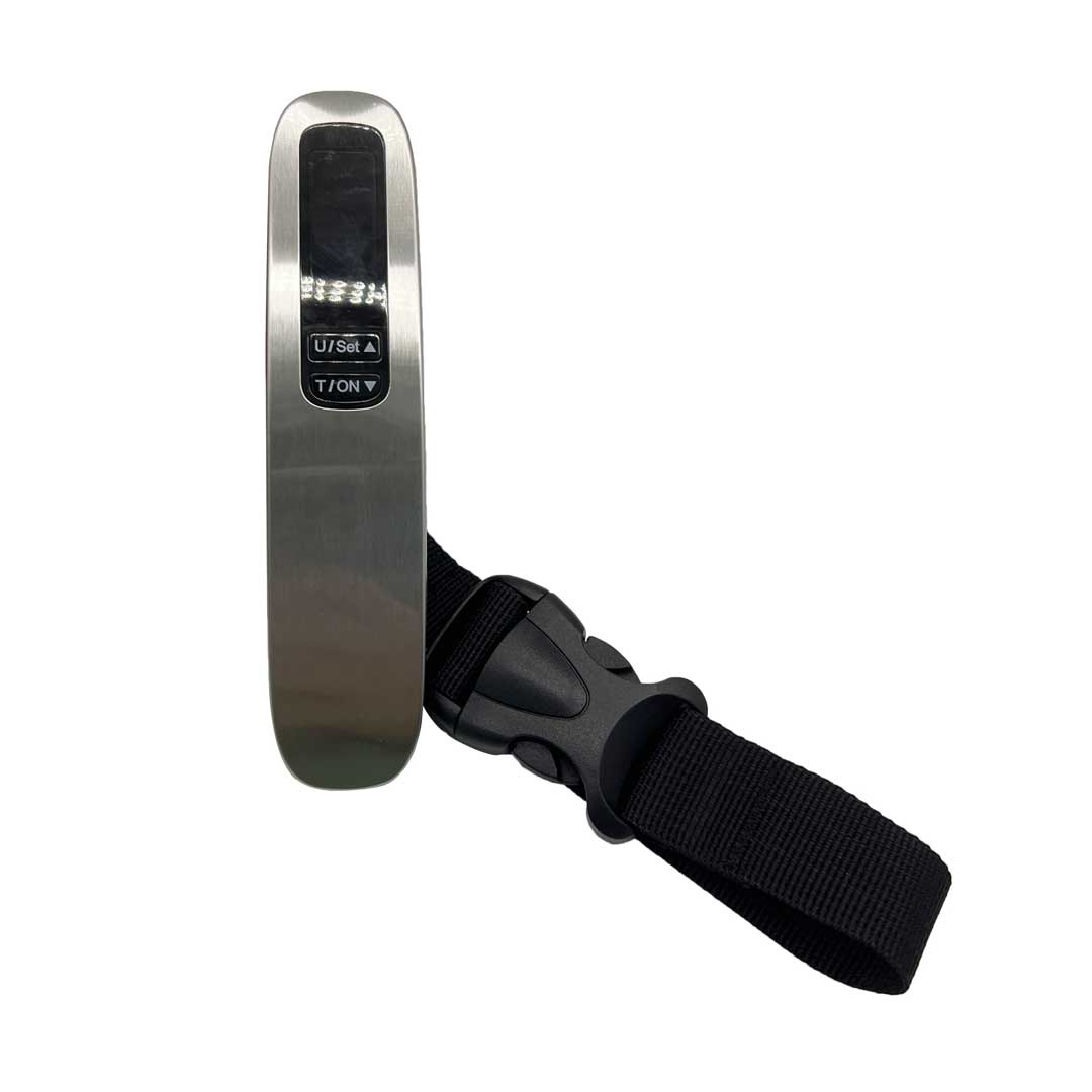 Compact metal medical device with a small display and two black buttons, attached to a black wrist strap for secure wear.